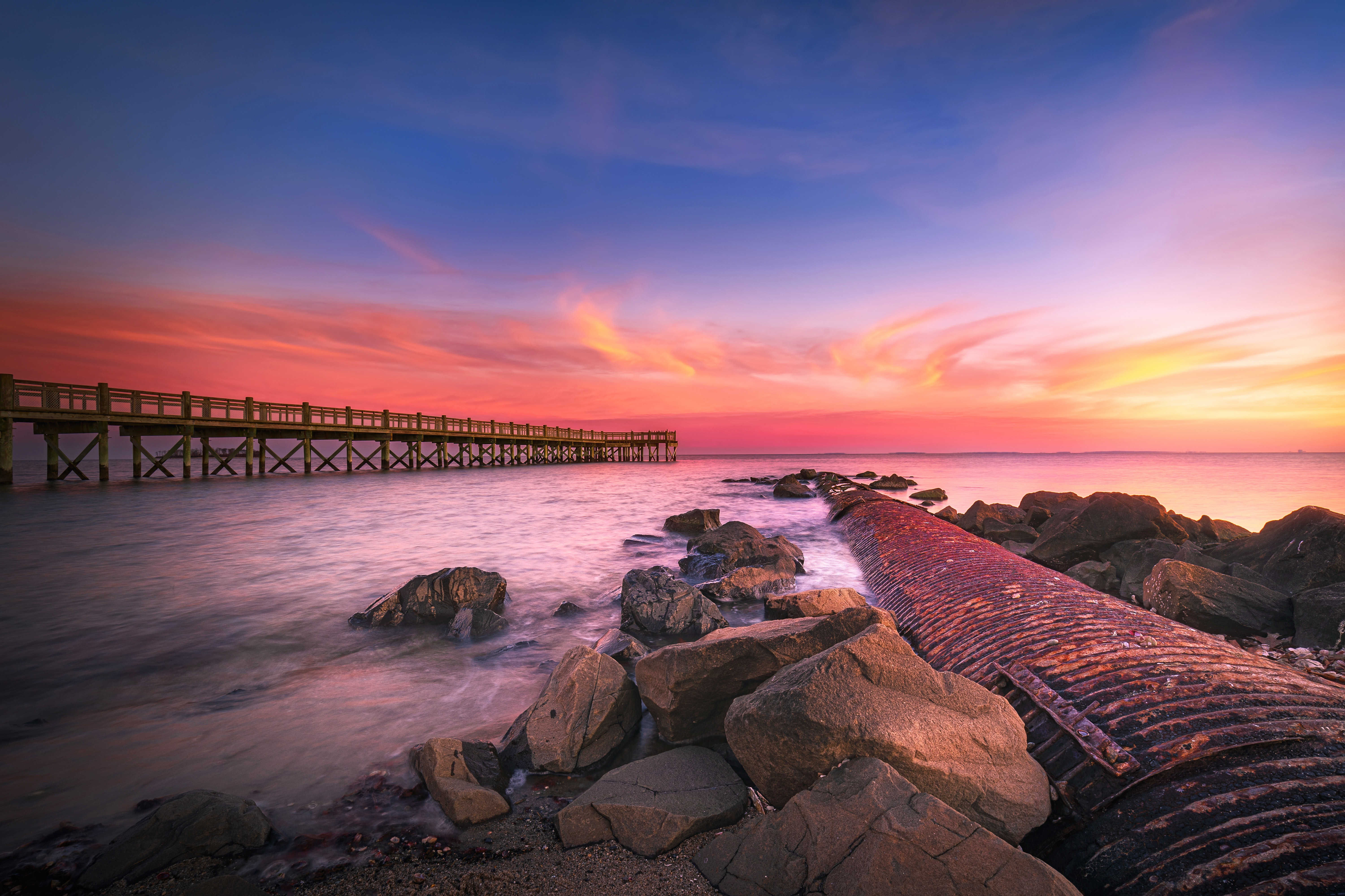 puesta de sol en la playa de Milford